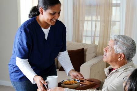 A carer thinking about Health Care High Risk Strategy from WorksafeBC