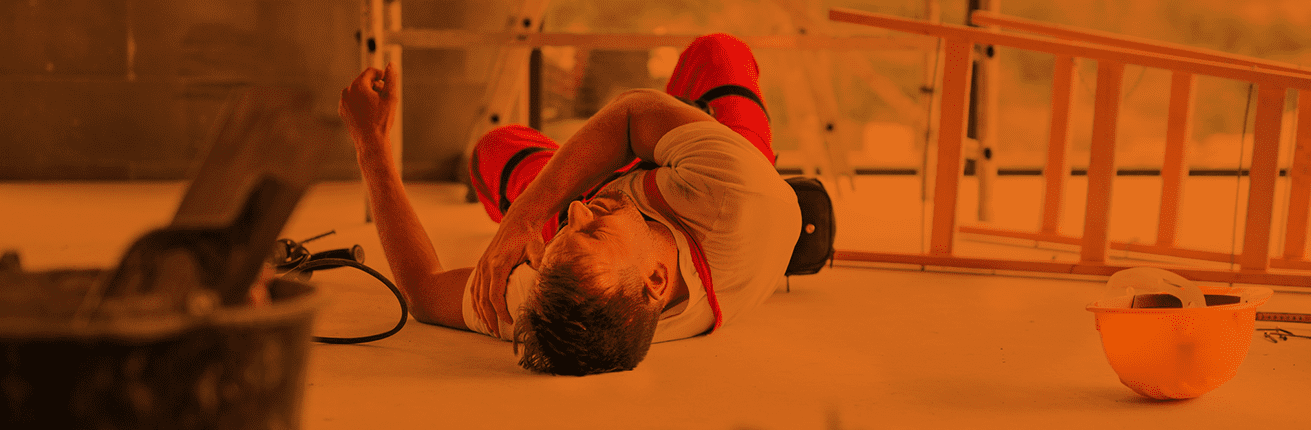 Worker injured on the floor detected by man down alarm device