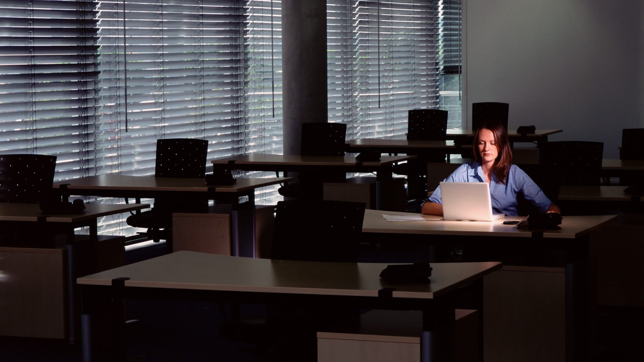 Lone female worker in office after hours