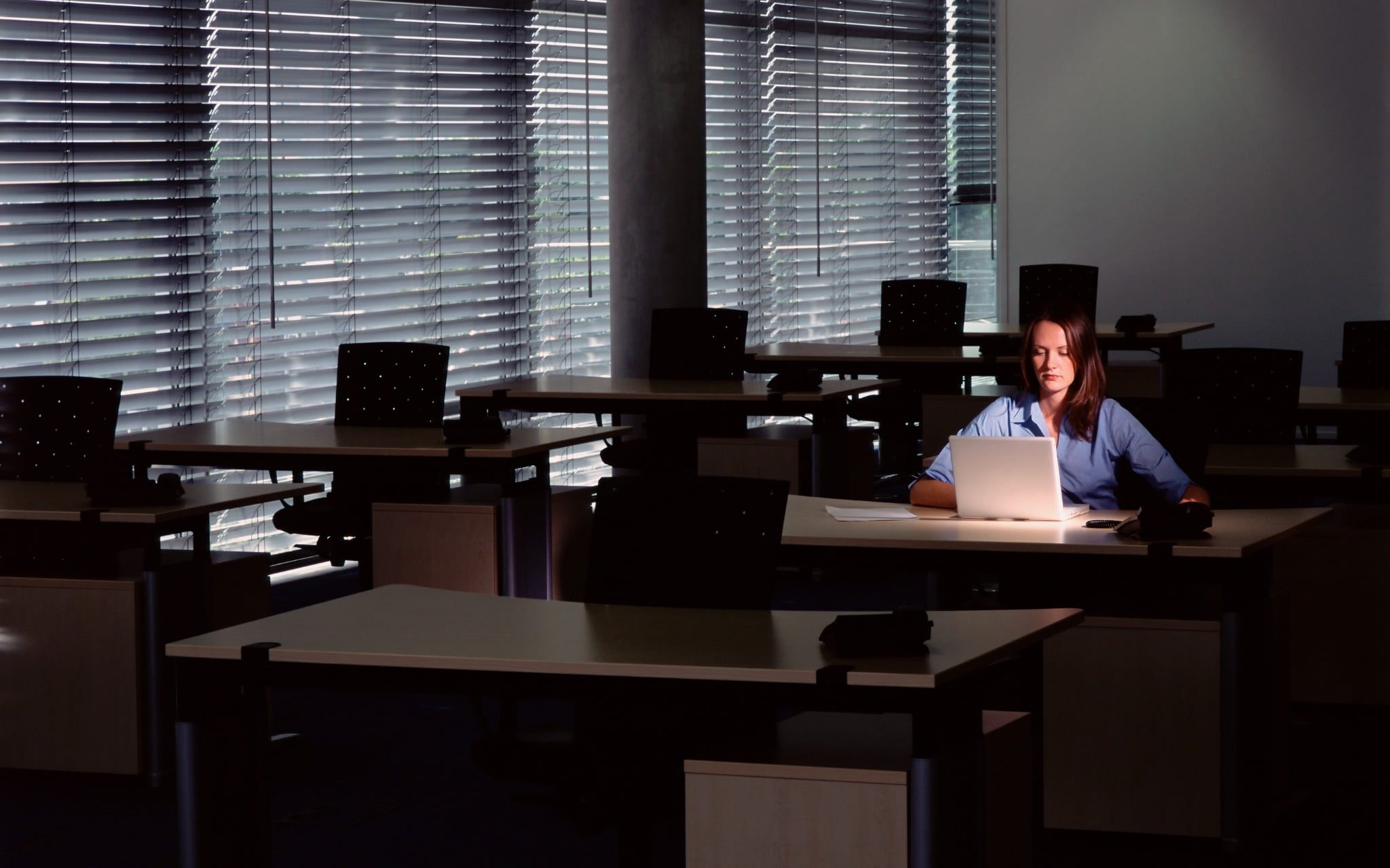 Lone female worker in office after hours