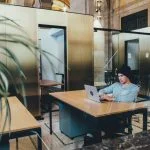 Office worker alone in shared space