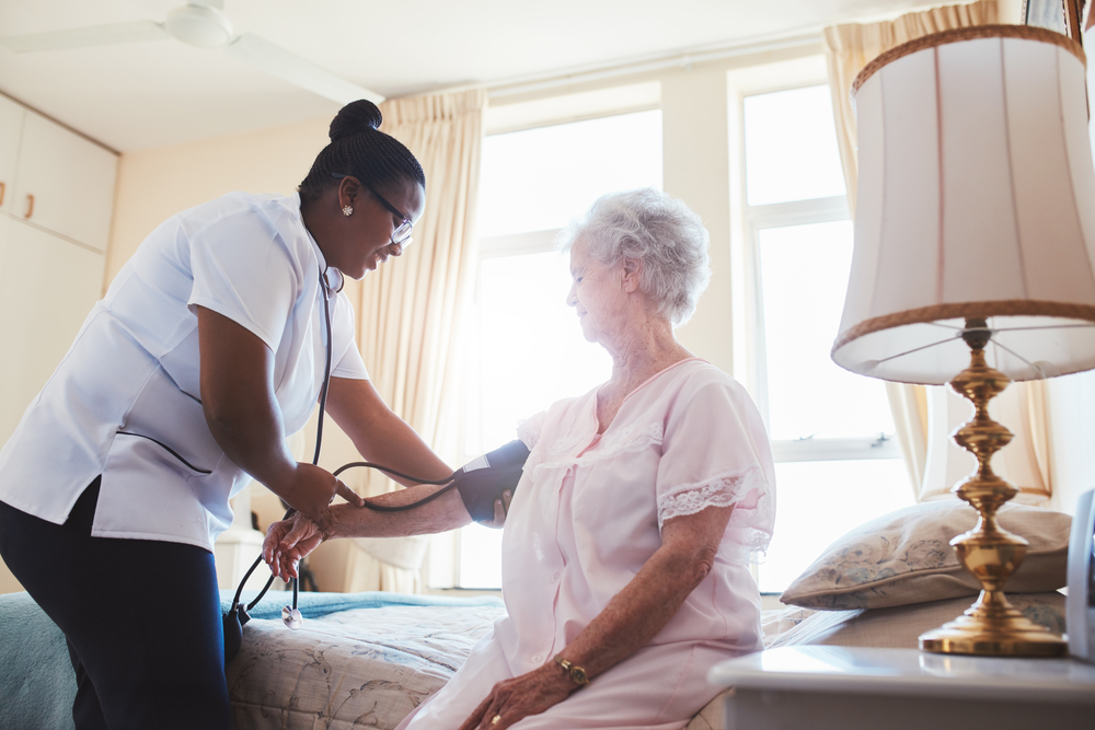 nurse-working-alone-visiting-patient-at-home