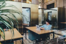 Office worker alone in shared space